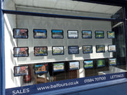 Claralight A4 estate agent window display