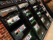 Illuminated estate agent window display