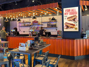 digital display board in cafe bar displaying food promotions